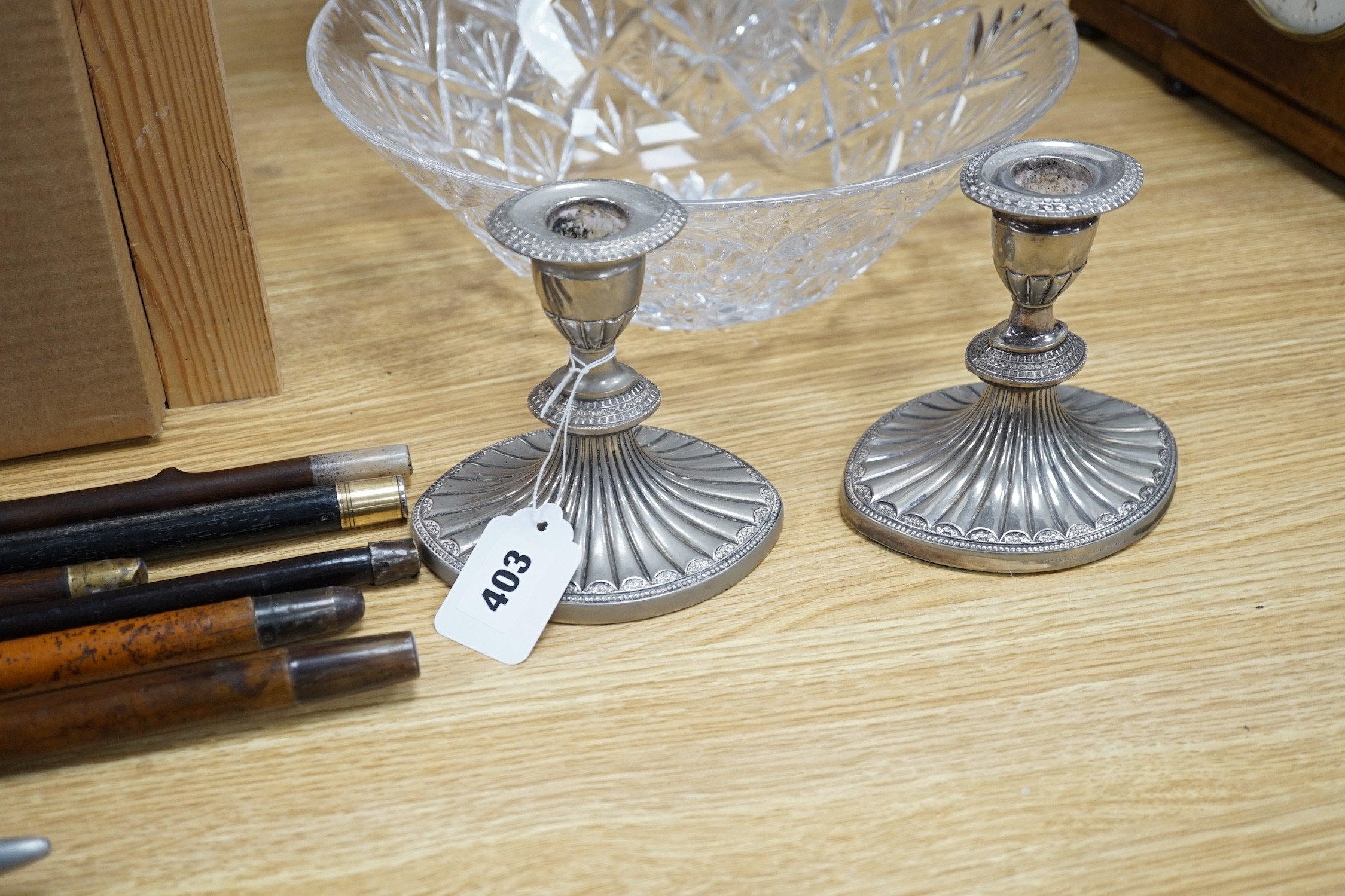 A pair of Doulton cut glass vases and a bowl plus a pair of silver plated candlesticks and a dish, vases 25cms high